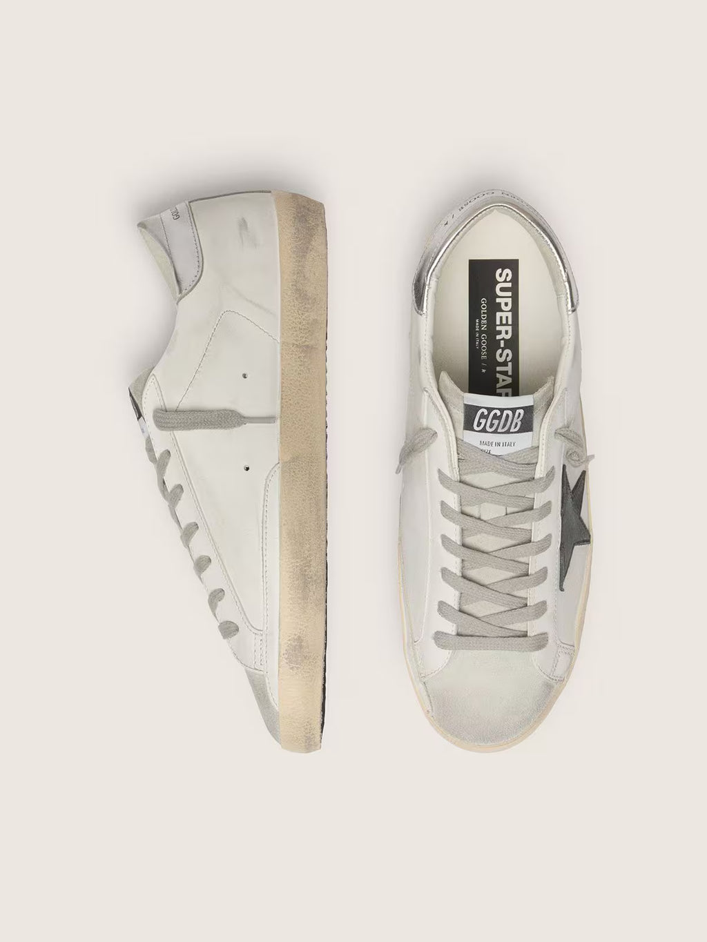 Super-Star en cuir blanc avec étoile en cuir nubuck noir et contrefort en cuir lamé argenté