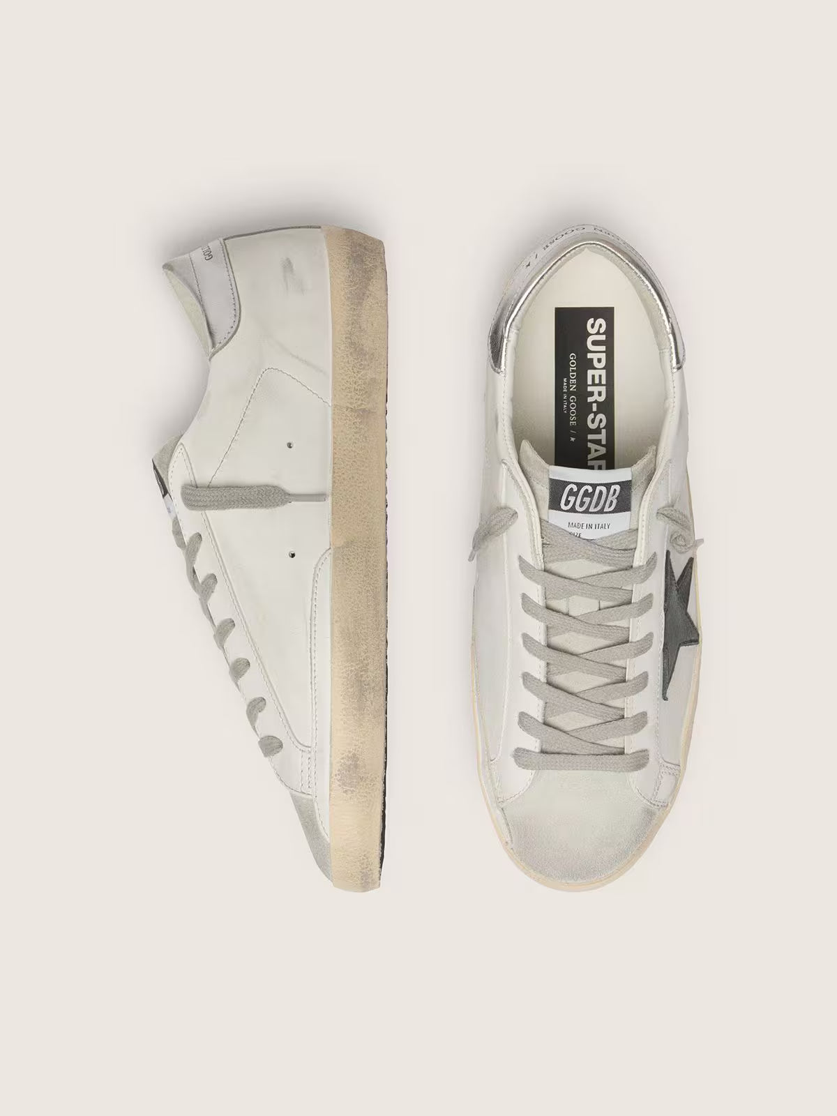 Super-Star en cuir blanc avec étoile en cuir nubuck noir et contrefort en cuir lamé argenté