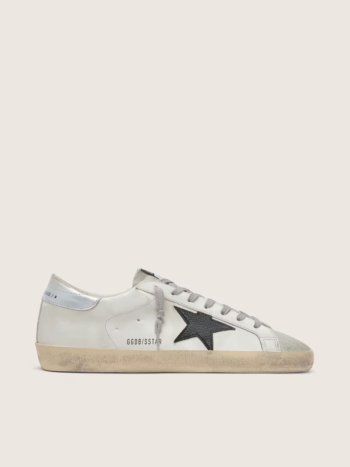 Super-Star en cuir blanc avec étoile en cuir nubuck noir et contrefort en cuir lamé argenté