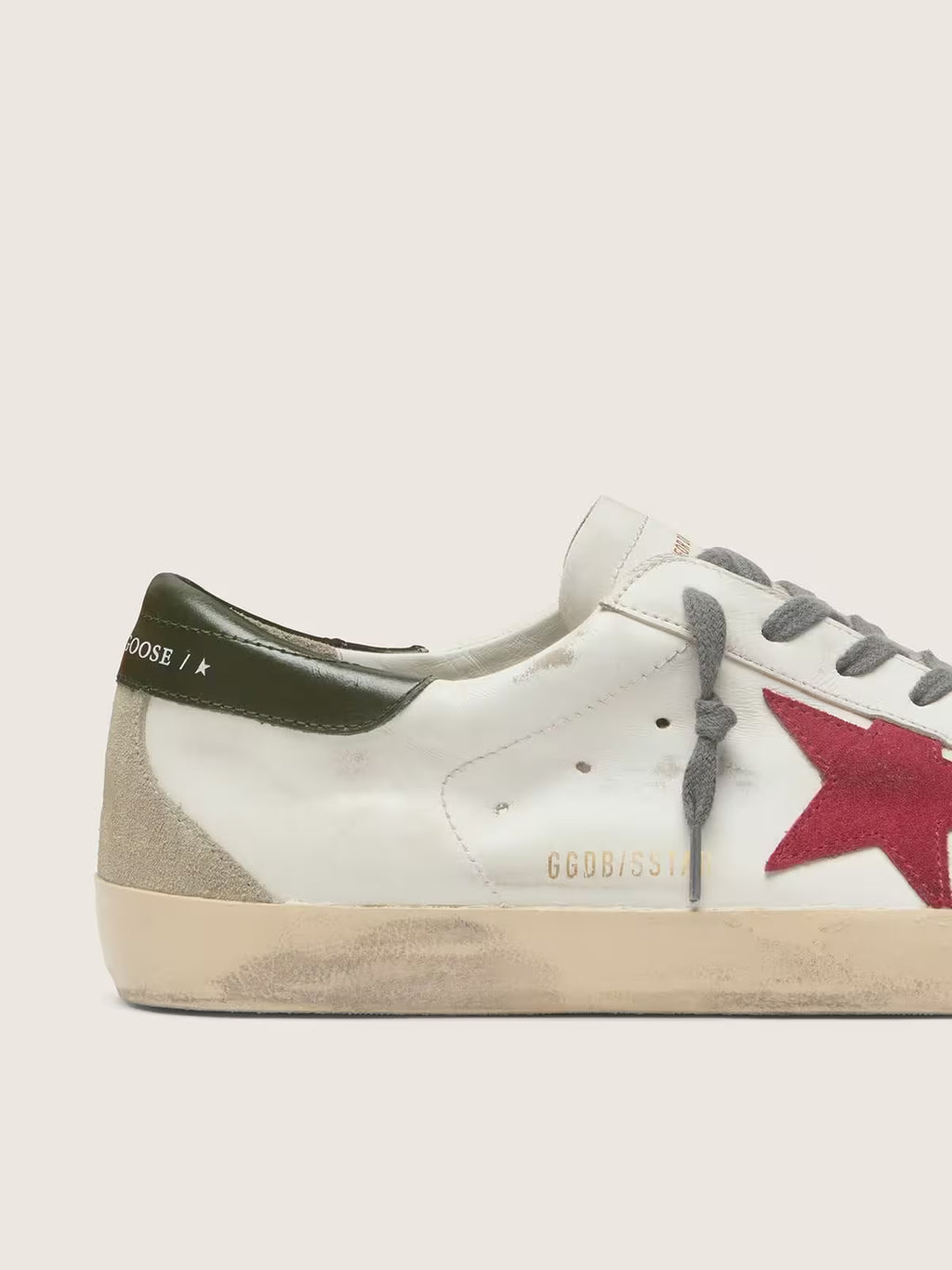 Super-Star avec étoile en daim rouge et contrefort en cuir vert