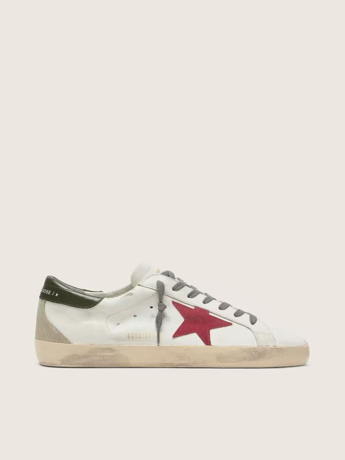 Super-Star avec étoile en daim rouge et contrefort en cuir vert