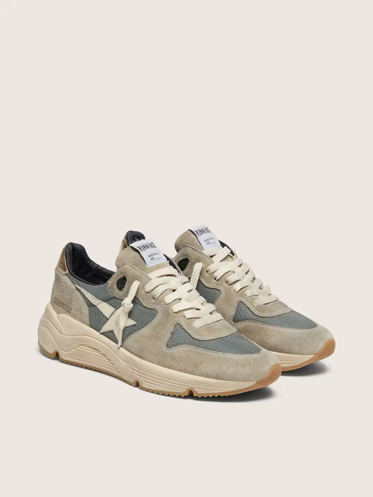 Running Sole en daim gris avec étoile et contrefort blancs