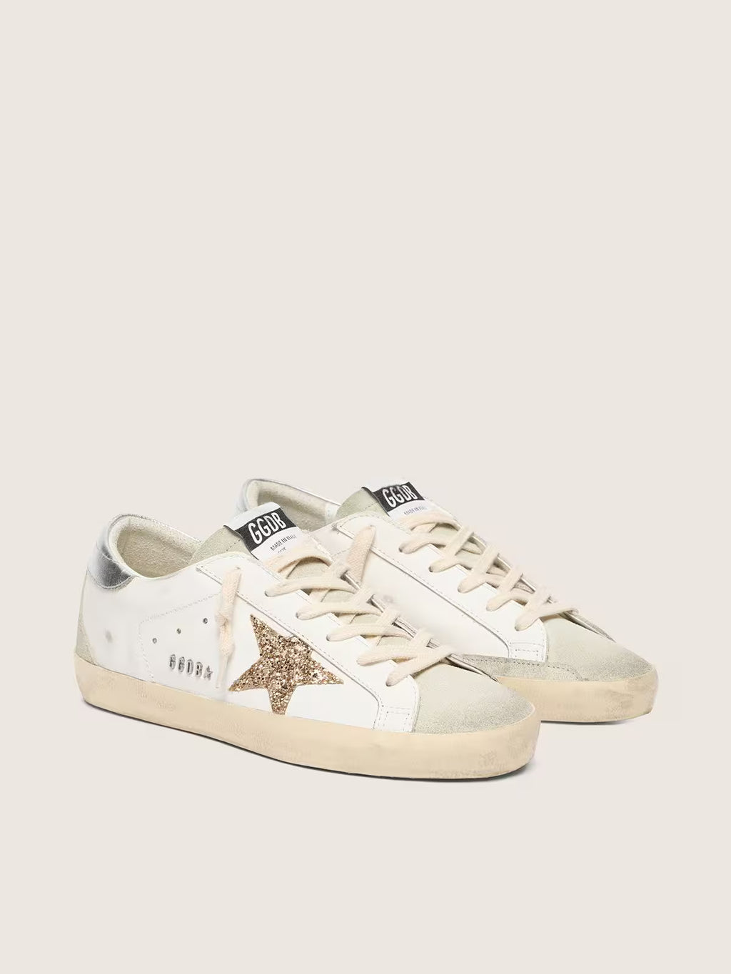 Super-Star avec étoile à paillettes dorées et empiècements en daim gris froid