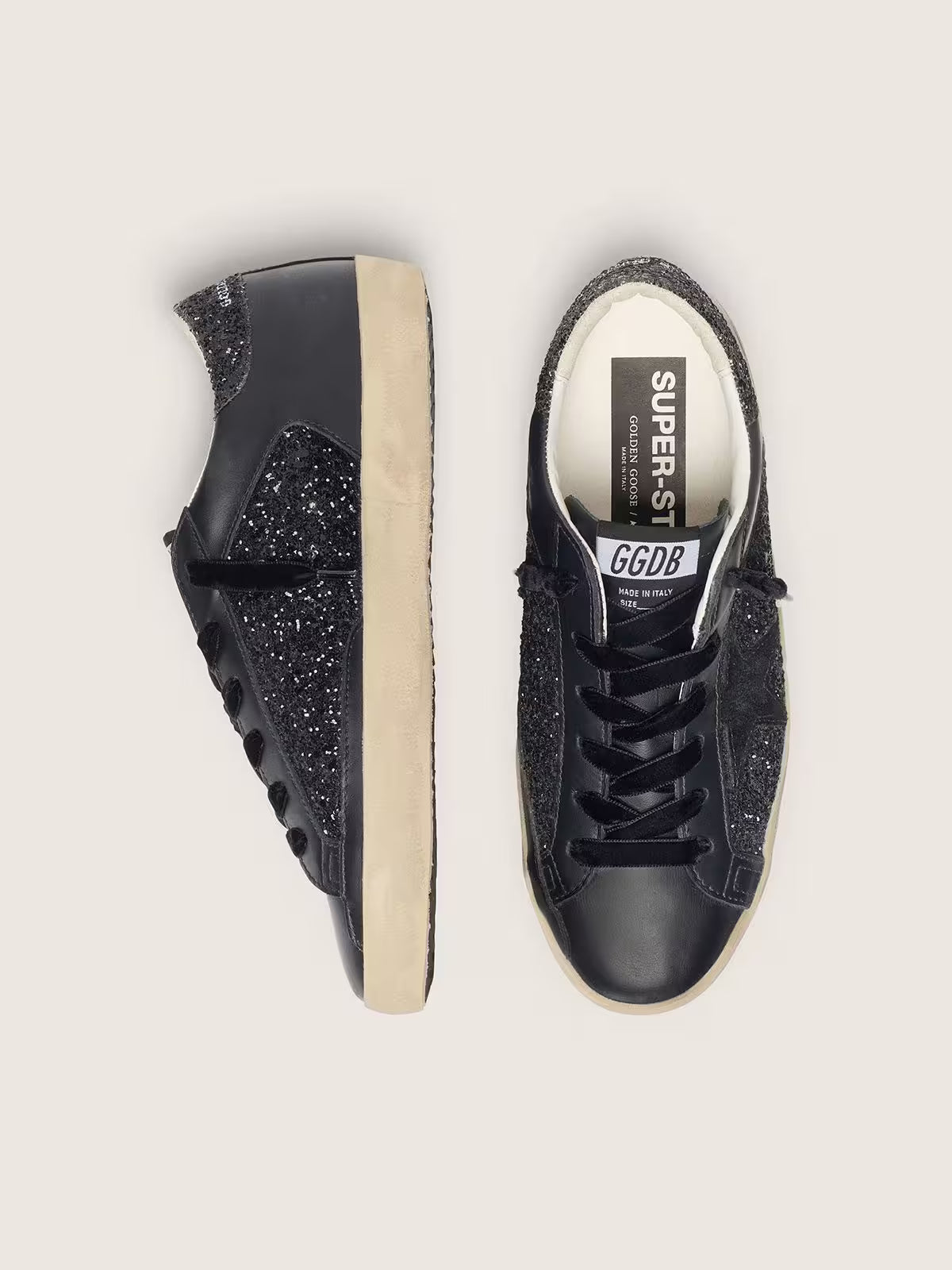 Super-Star pour femme à paillettes noires avec étoile en daim noir et empiècements en cuir